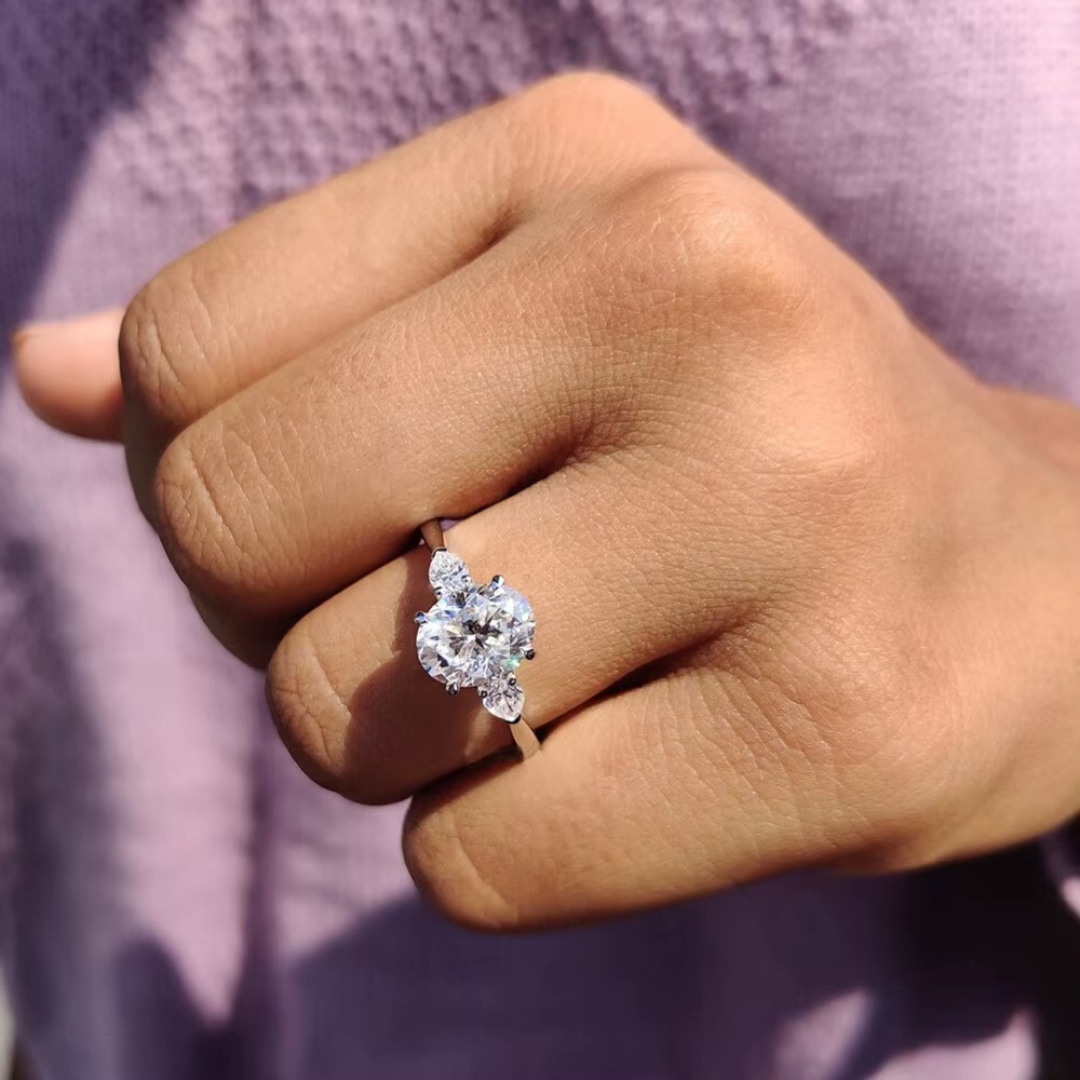Oval Diamond and Pear Diamond Three Stone Engagement Ring in 10K/14K gold and platinum with certified lab-grown or natural diamonds
