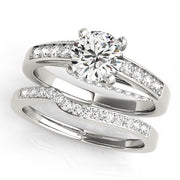 Exquisite Prong-Set Round Diamond Engagement Ring in 10K/14K gold and platinum with certified lab-grown or natural diamonds