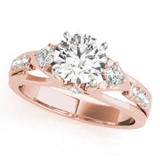 Vintage-Inspired Three-Stone Round Diamond Engagement Ring in 10K/14K gold and platinum with certified lab-grown or natural diamonds