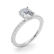 Timeless Hidden Halo Oval Single Row Oval Diamond Engagement Ring in 10K/14K gold and platinum with certified lab-grown or natural diamonds