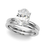 Regal Sidestone Oval Diamond Engagement Ring â€” 10K/14K Gold & Platinum