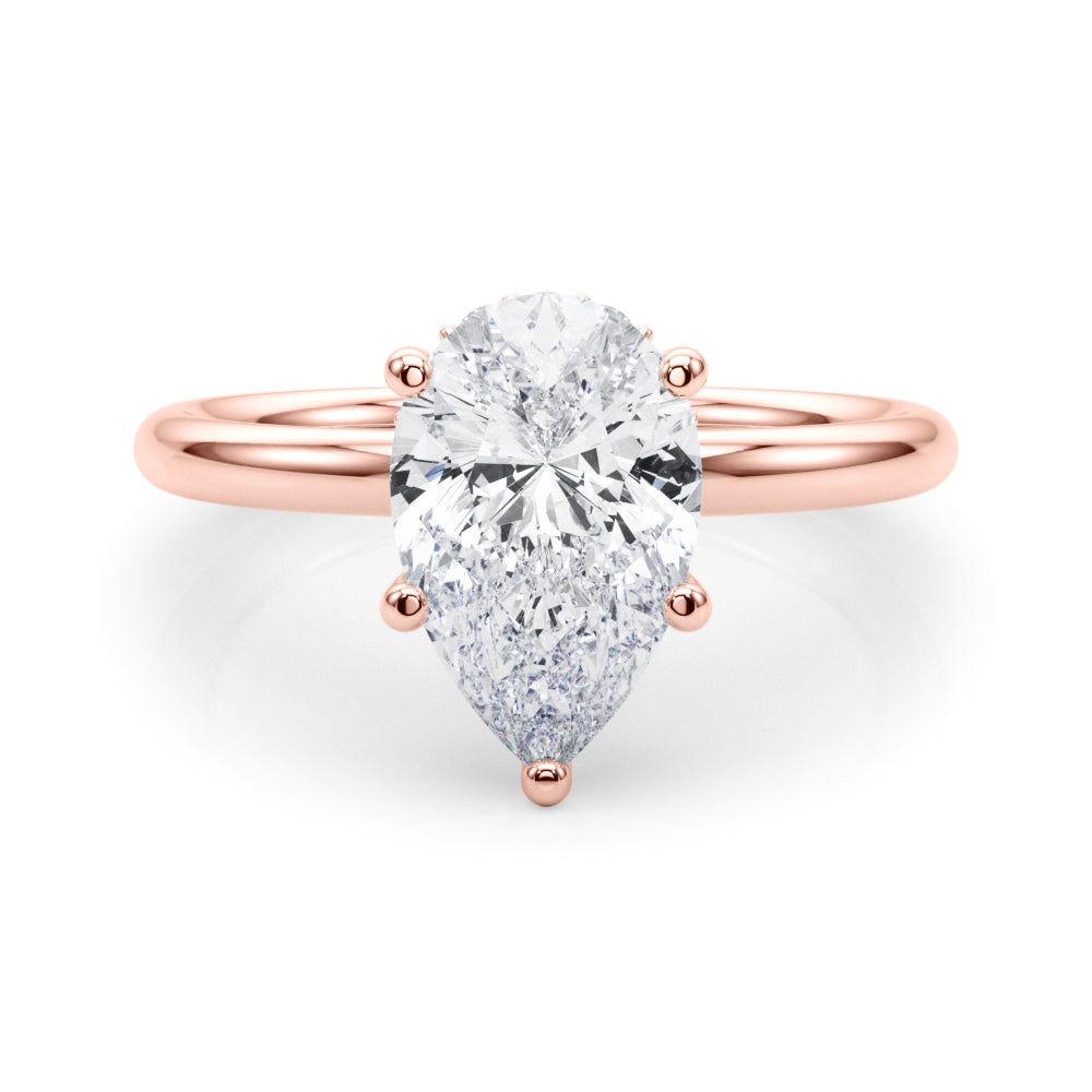 Iconic Sidestone Pear Diamond Engagement Ring â€” 10K/14K Gold & Platinum