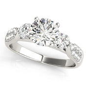 Elegant Round Diamond Three Stone Ring in 10K/14K gold and platinum with certified lab-grown or natural diamonds