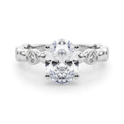 Enchanted Sidestone Round Diamond Engagement Ring in 10K/14K gold and platinum with certified lab-grown or natural diamonds