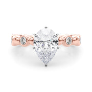 Enchanted Sidestone Round Diamond Engagement Ring in 10K/14K gold and platinum with certified lab-grown or natural diamonds