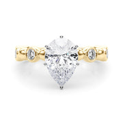 Enchanted Sidestone Round Diamond Engagement Ring in 10K/14K gold and platinum with certified lab-grown or natural diamonds