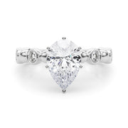 Enchanted Sidestone Round Diamond Engagement Ring in 10K/14K gold and platinum with certified lab-grown or natural diamonds
