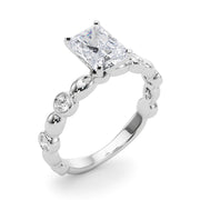 Enchanted Sidestone Round Diamond Engagement Ring in 10K/14K gold and platinum with certified lab-grown or natural diamonds