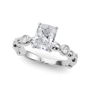 Enchanted Sidestone Round Diamond Engagement Ring in 10K/14K gold and platinum with certified lab-grown or natural diamonds