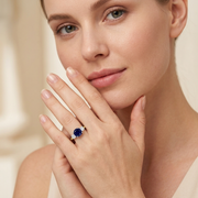 Round Blue Sapphire Three Stone Ring in 10K/14K gold and platinum with certified lab-grown or natural diamonds