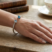 Blue Topaz Open Cuff Bangle with Natural Diamond Halo Ends in 10K/14K gold and platinum with certified lab-grown or natural diamonds
