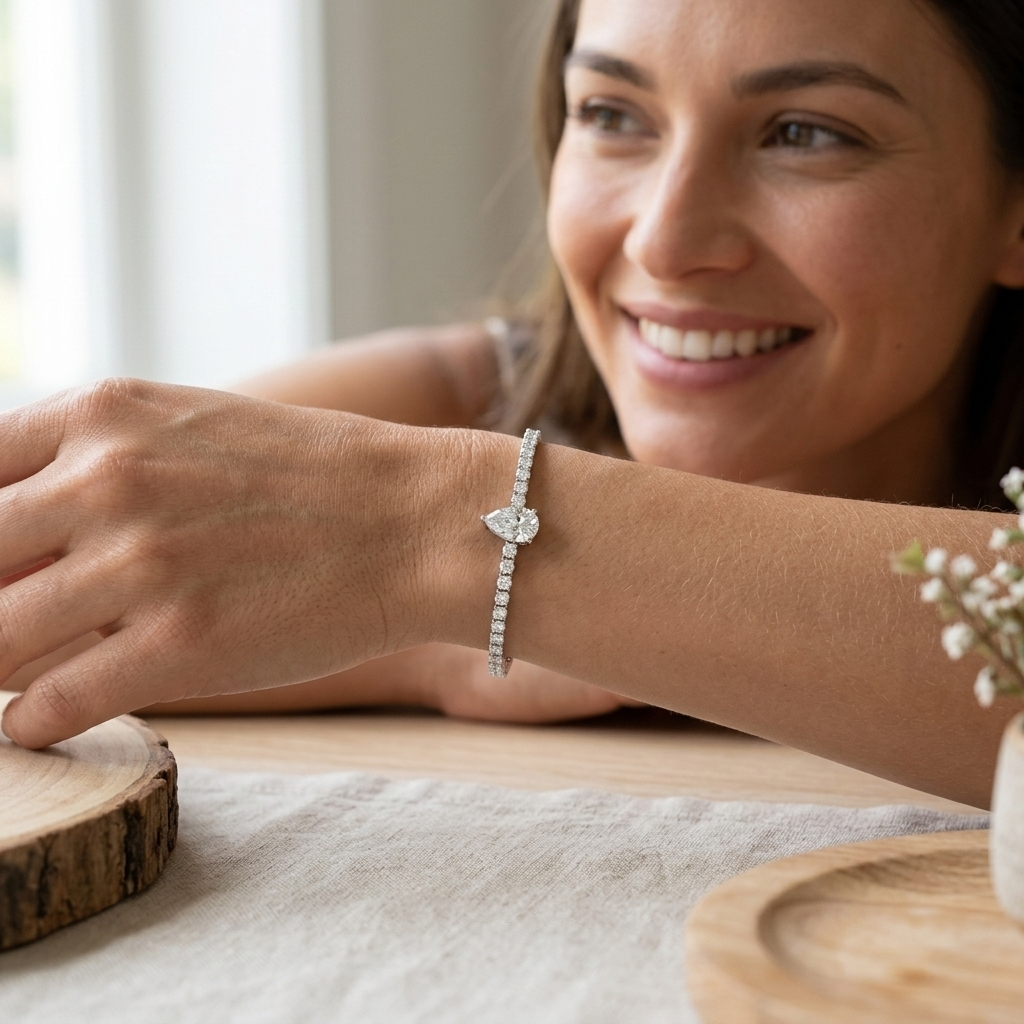 Pear Cut Lab Grown Diamond Tennis Bracelet with Round Prong Set Diamonds in 10K/14K gold and platinum with certified lab-grown or natural diamonds