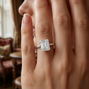 Baguette & Round Cut Diamond Halo Sytle Engagement Ring in 10K/14K gold and platinum with certified lab-grown or natural diamonds