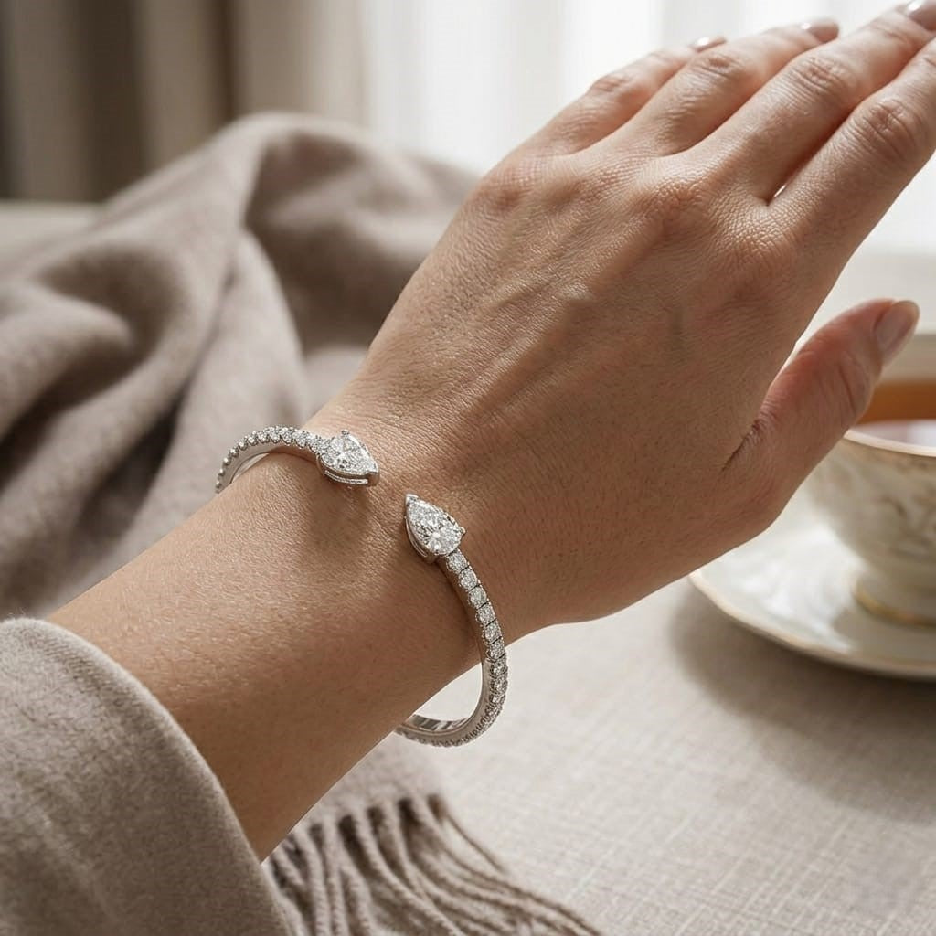 Natural Round Pave Open Cuff Diamond Bangle with Pear Solitaire Ends in 10K/14K gold and platinum with certified lab-grown or natural diamonds