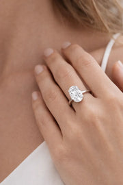 Elegant Oval Diamond Solitaire Engagement Ring in 10K/14K gold and platinum with certified lab-grown or natural diamonds