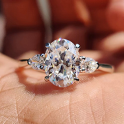 Oval Diamond and Pear Diamond Three Stone Engagement Ring in 10K/14K gold and platinum with certified lab-grown or natural diamonds