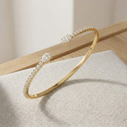 Natural Round Pave Open Cuff Diamond Bangle with Oval Solitaire Ends in 10K/14K gold and platinum with certified lab-grown or natural diamonds