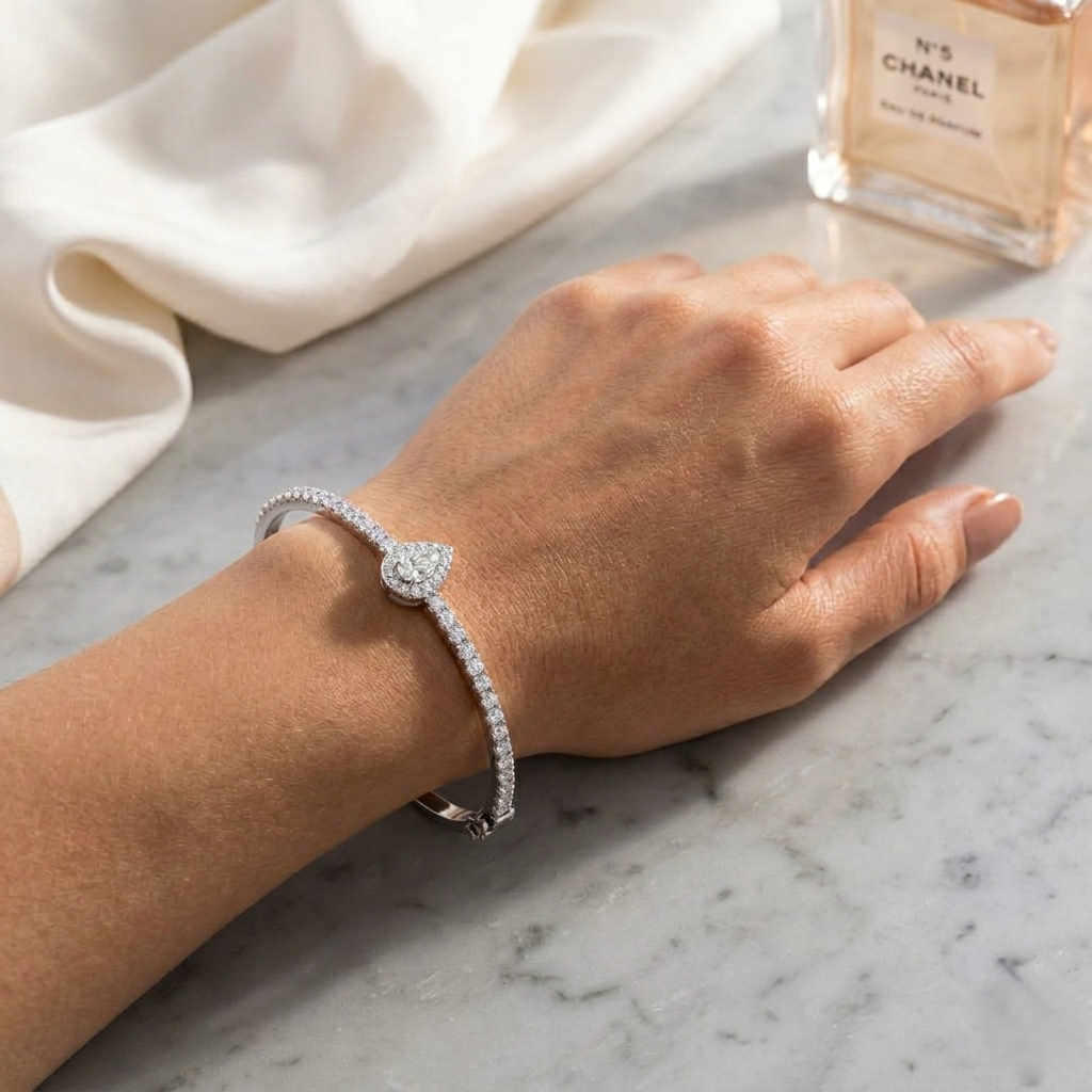 Lab Grown Pear Cut Halo Diamond with Round Accent Bangle with Box Lock in 10K/14K gold and platinum with certified lab-grown or natural diamonds