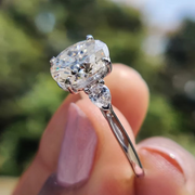 Oval Diamond and Pear Diamond Three Stone Engagement Ring in 10K/14K gold and platinum with certified lab-grown or natural diamonds
