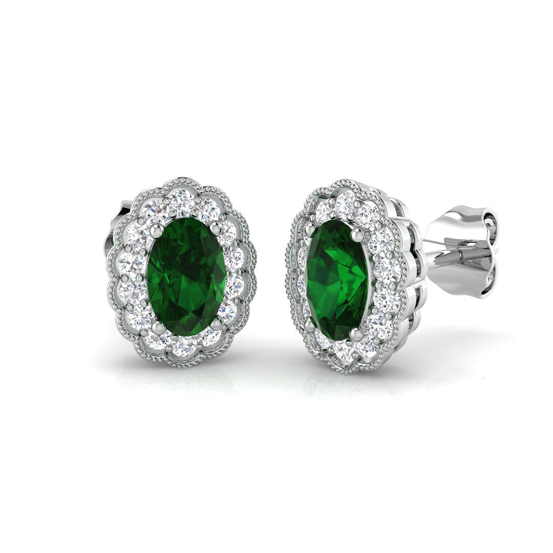 Oval Cut Emerald Halo Stud Earrings in 10K/14K gold and platinum with certified lab-grown or natural diamonds
