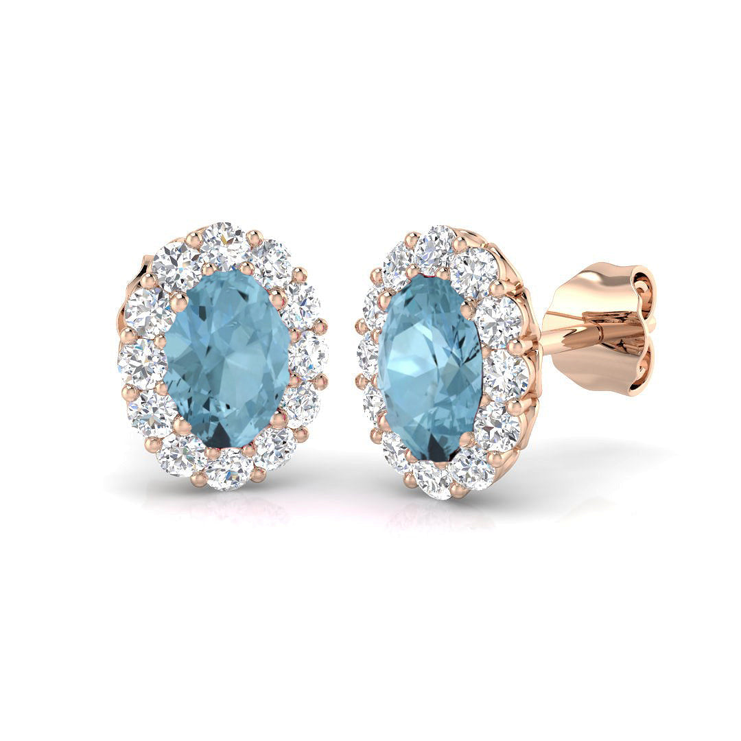 Oval Cut Aquamarine Halo Stud Earrings in 10K/14K gold and platinum with certified lab-grown or natural diamonds