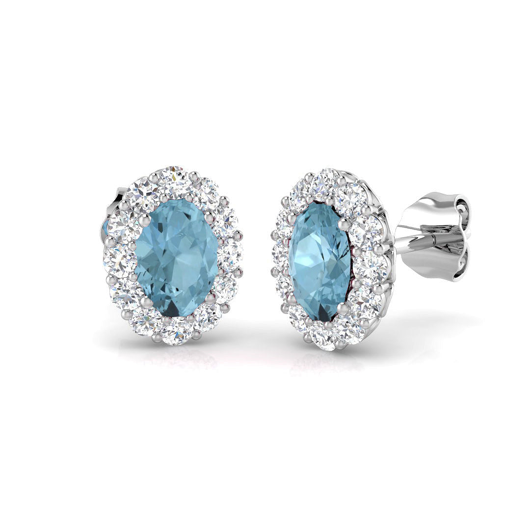 Oval Cut Aquamarine Halo Stud Earrings in 10K/14K gold and platinum with certified lab-grown or natural diamonds