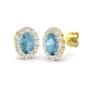 Oval Cut Aquamarine Halo Stud Earrings in 10K/14K gold and platinum with certified lab-grown or natural diamonds