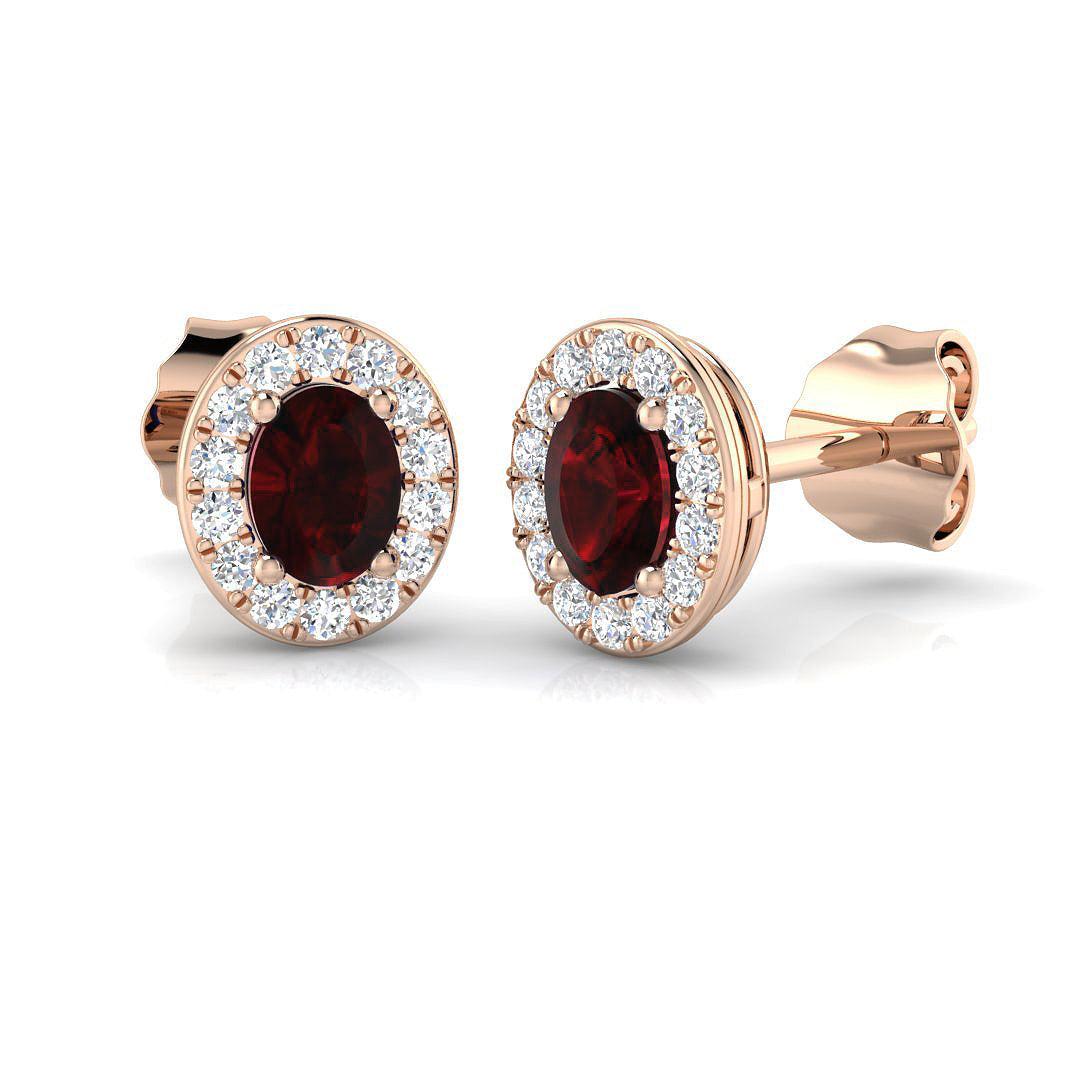 Oval Cut Ruby Halo Stud Earrings in 10K/14K gold and platinum with certified lab-grown or natural diamonds
