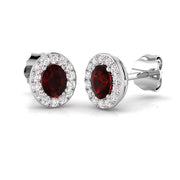 Oval Cut Ruby Halo Stud Earrings in 10K/14K gold and platinum with certified lab-grown or natural diamonds