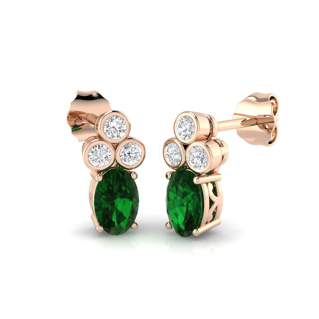 Oval Cut Emerald Diamond Earrings in 10K/14K gold and platinum with certified lab-grown or natural diamonds