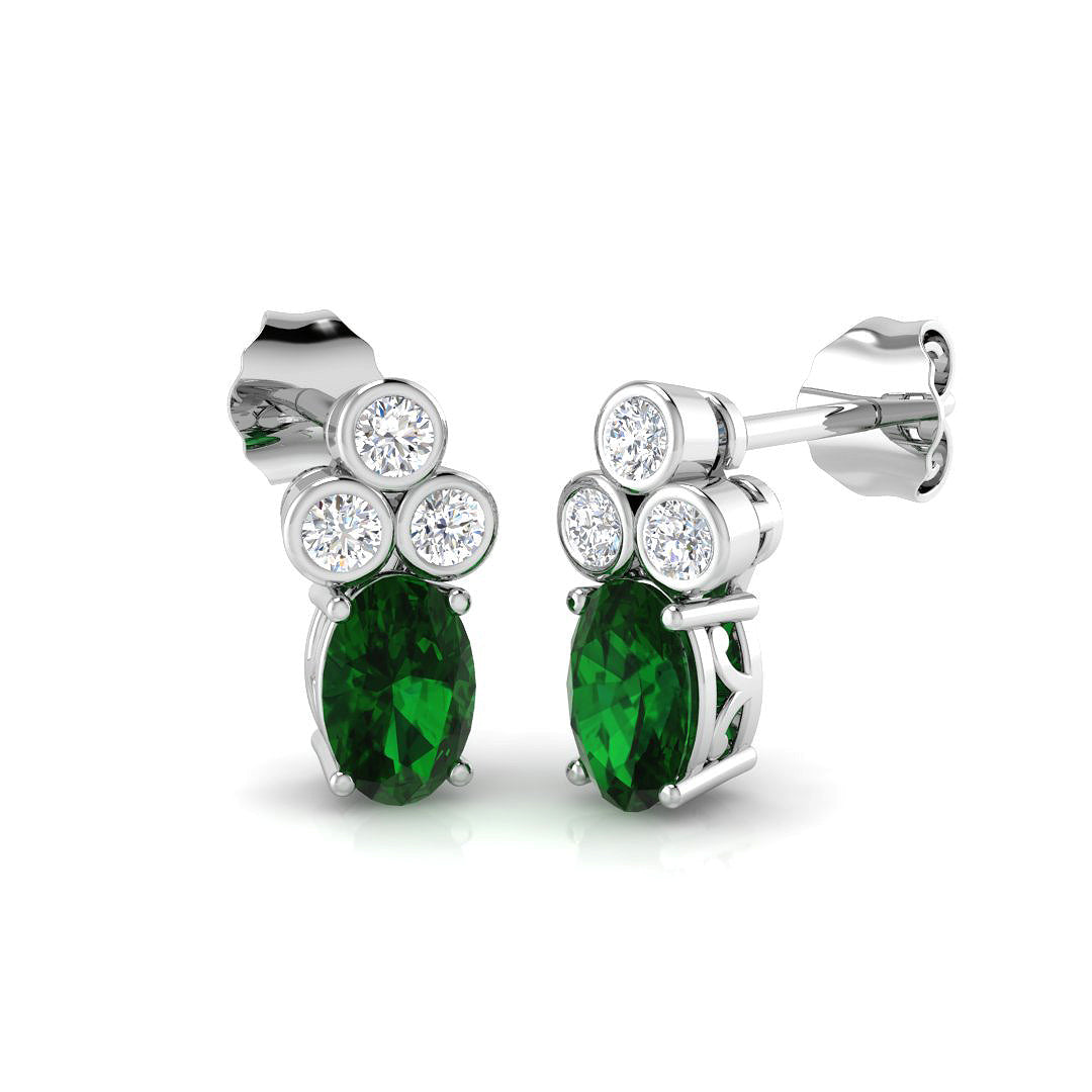 Oval Cut Emerald Diamond Earrings in 10K/14K gold and platinum with certified lab-grown or natural diamonds