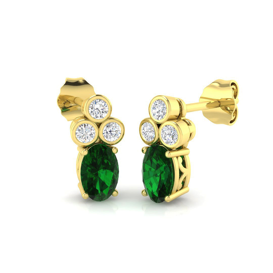 Oval Cut Emerald Diamond Earrings in 10K/14K gold and platinum with certified lab-grown or natural diamonds