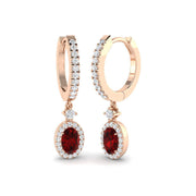 Oval Cut Ruby Diamond Drop Earrings with Pave Diamonds in 10K/14K gold and platinum with certified lab-grown or natural diamonds