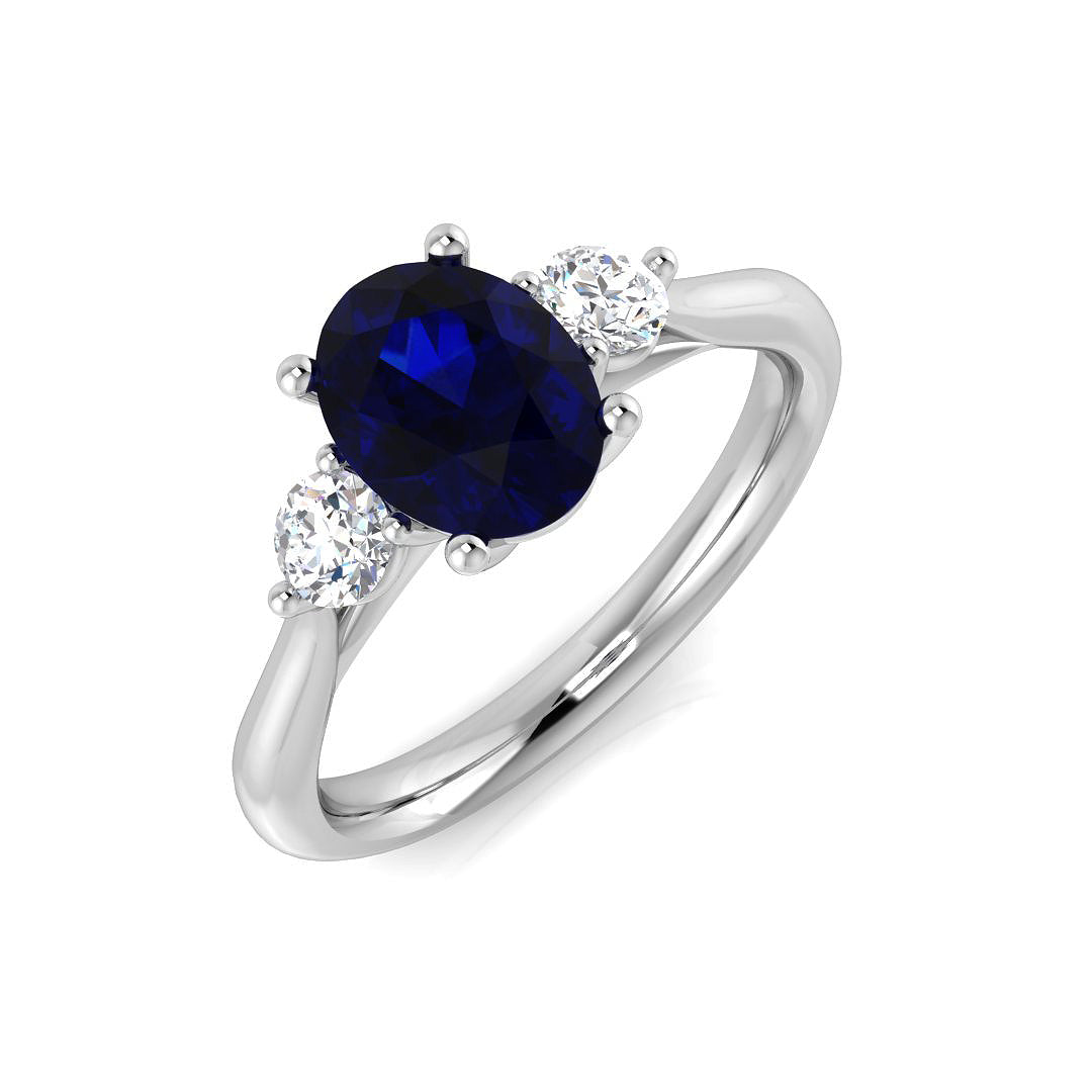 Oval Cut Blue Sapphire Trilogy Ring with Round Diamonds Side Stones in 10K/14K gold and platinum with certified lab-grown or natural diamonds