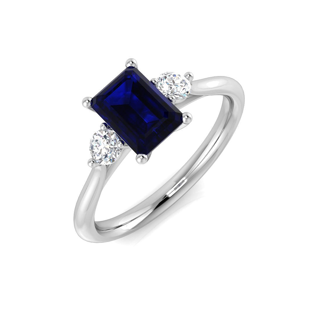 Emerald Cut Blue Sapphire Three Stone Ring in 10K/14K gold and platinum with certified lab-grown or natural diamonds