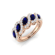 Blue Sapphire Five Stone Ring Oval Cut with Natural Round Side Accents in 10K/14K gold and platinum with certified lab-grown or natural diamonds