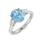 Oval Cut Aquamarine Three Stone Ring with Diamond Side Stones in 10K/14K gold and platinum with certified lab-grown or natural diamonds