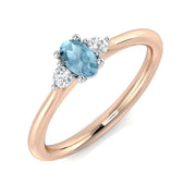 Oval Cut Aquamarine Ring with Diamond Side Stones in 10K/14K gold and platinum with certified lab-grown or natural diamonds