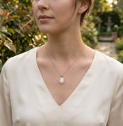 Opal Pendant with Diamond Halo in 10K/14K gold and platinum with certified lab-grown or natural diamonds