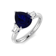 Pear Cut Blue Sapphire Three Stone Ring with Natural Baguette Side Stones in 10K/14K gold and platinum with certified lab-grown or natural diamonds