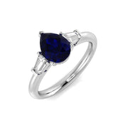Pear Blue Sapphire & Emerald Cut Diamond Three Stone Engagement Ring in 10K/14K gold and platinum with certified lab-grown or natural diamonds