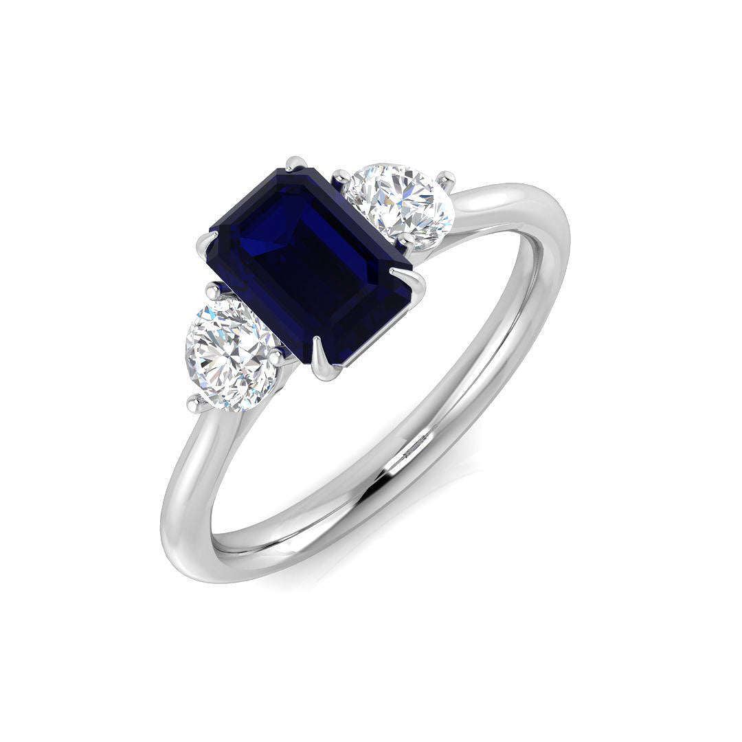 Three Stone Emerald Cut Blue Sapphire Ring with Round Diamond Side Stones in 10K/14K gold and platinum with certified lab-grown or natural diamonds