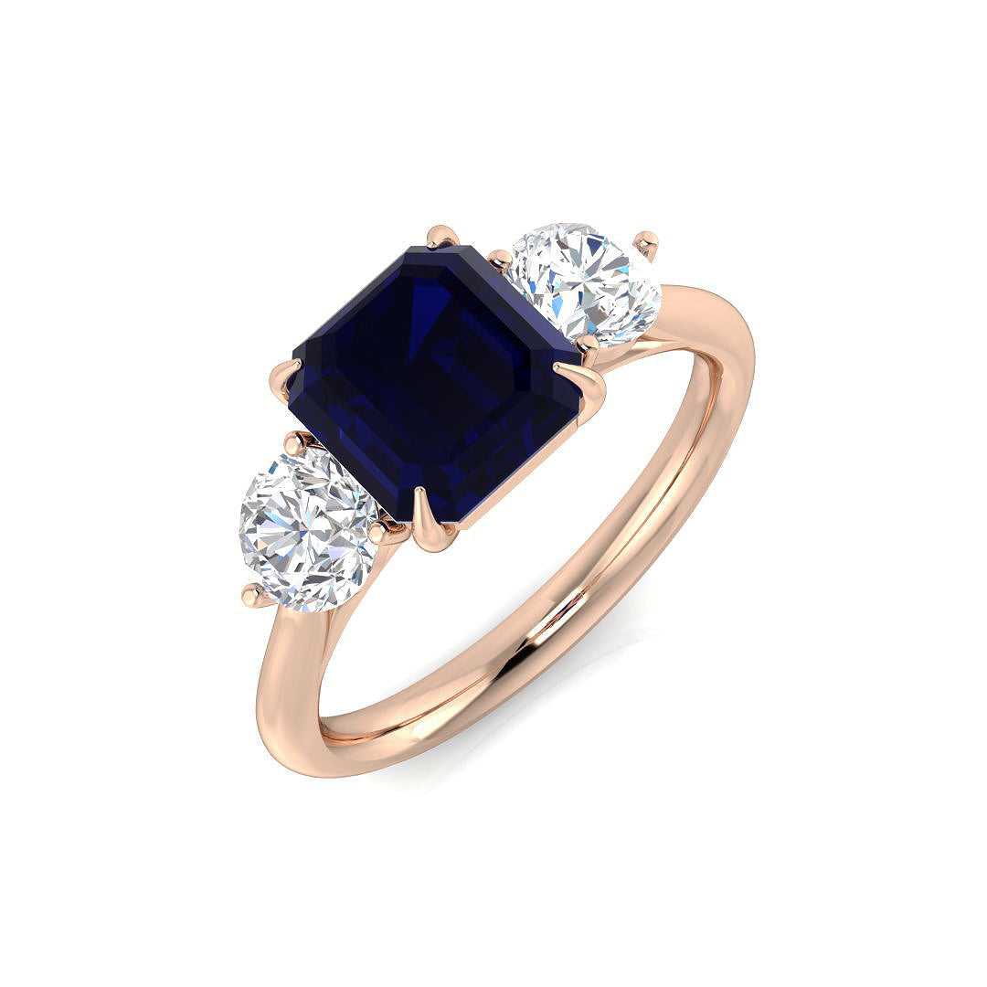 Emerald Cut Blue Sapphire Three Stone Ring with Natural Round Diamonds in 10K/14K gold and platinum with certified lab-grown or natural diamonds