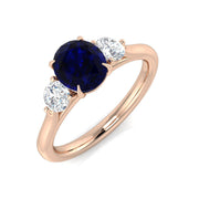 Round Cut Natural Diamond Three-Stone Ring with Oval Colour Gemstone in 10K/14K gold and platinum with certified lab-grown or natural diamonds