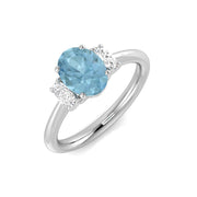 Oval Cut Aquamarine Trilogy Ring with Natural Diamond Side Stones in 10K/14K gold and platinum with certified lab-grown or natural diamonds