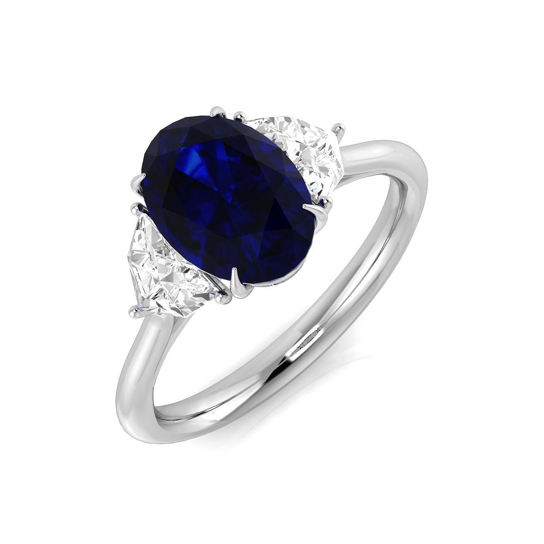 Oval Blue Sapphire & Trillion Diamond Three Stone Engagement Ring in 10K/14K gold and platinum with certified lab-grown or natural diamonds