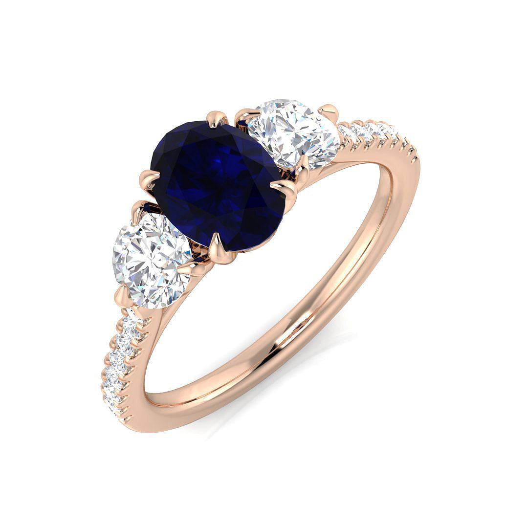 Oval Blue Sapphire Three Stone Ring in 10K/14K gold and platinum with certified lab-grown or natural diamonds