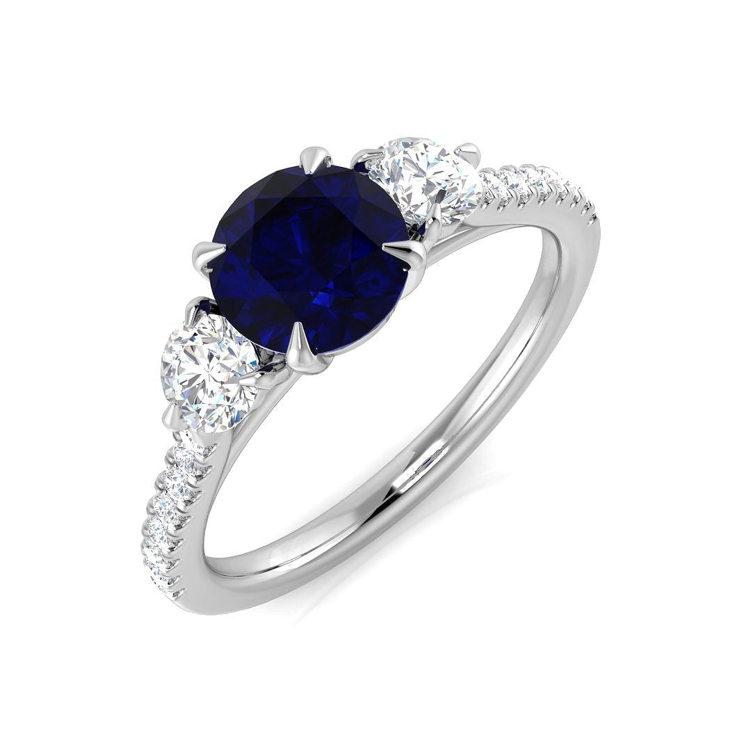 Round Blue Sapphire & Oval Diamond Three Stone Ring in 10K/14K gold and platinum with certified lab-grown or natural diamonds
