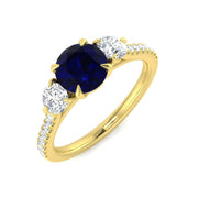 Round Blue Sapphire & Oval Diamond Three Stone Ring in 10K/14K gold and platinum with certified lab-grown or natural diamonds
