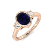 Oval Blue Sapphire & Baguette Diamond Bezel Engagement Ring in 10K/14K gold and platinum with certified lab-grown or natural diamonds